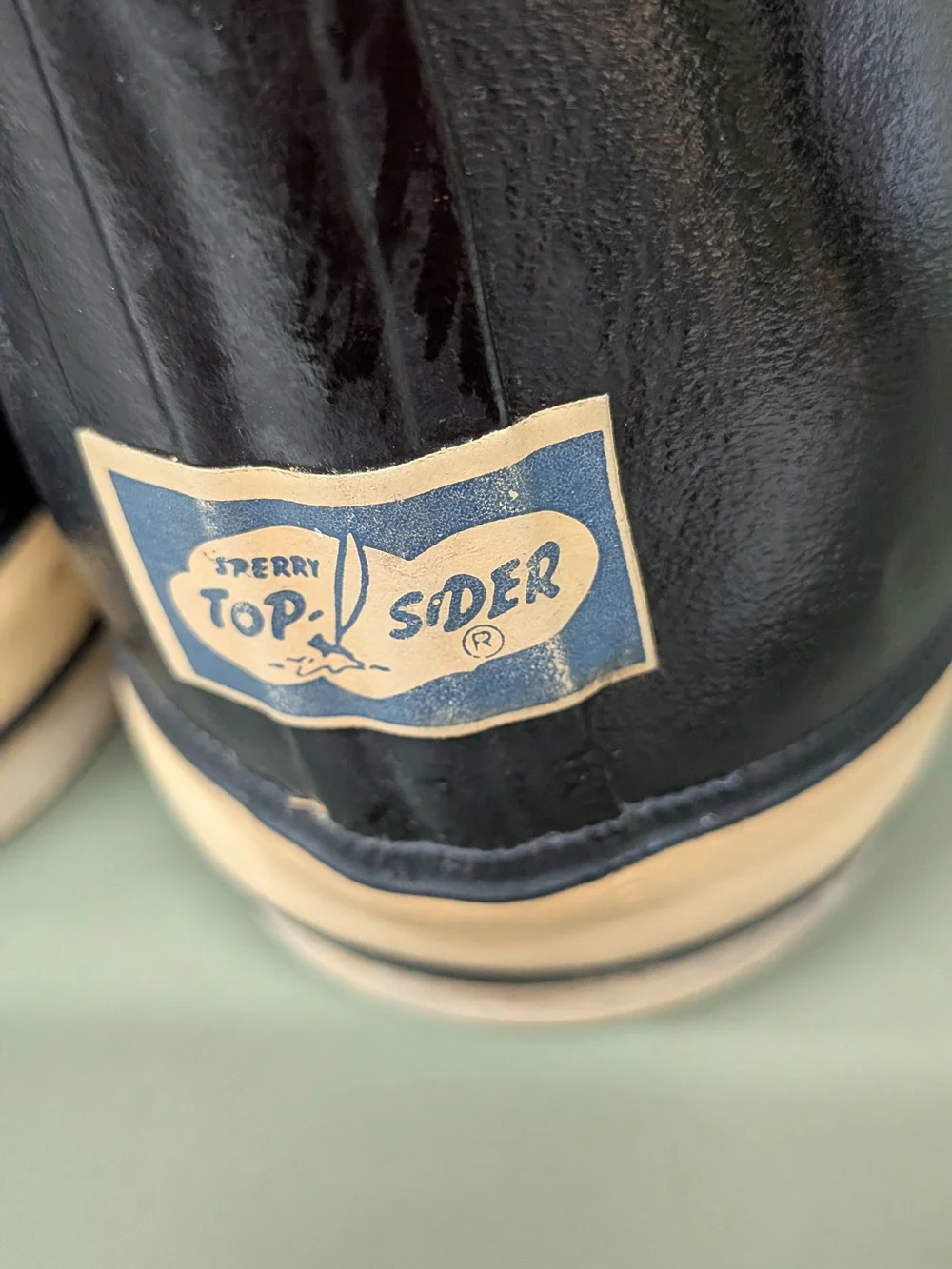Sperry Top Siders Black Rain & Snow Boots with Cream Trim.